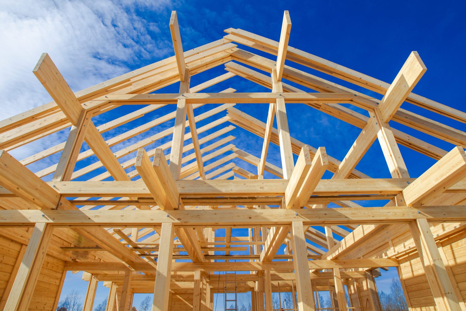 A,Frame,Of,A,House,Against,A,Blue,Sky.,The